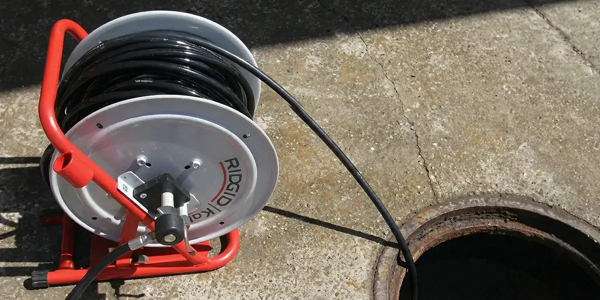 sewer rodding equipment prepared to clear clogged sewer lines in Phoenix, AZ